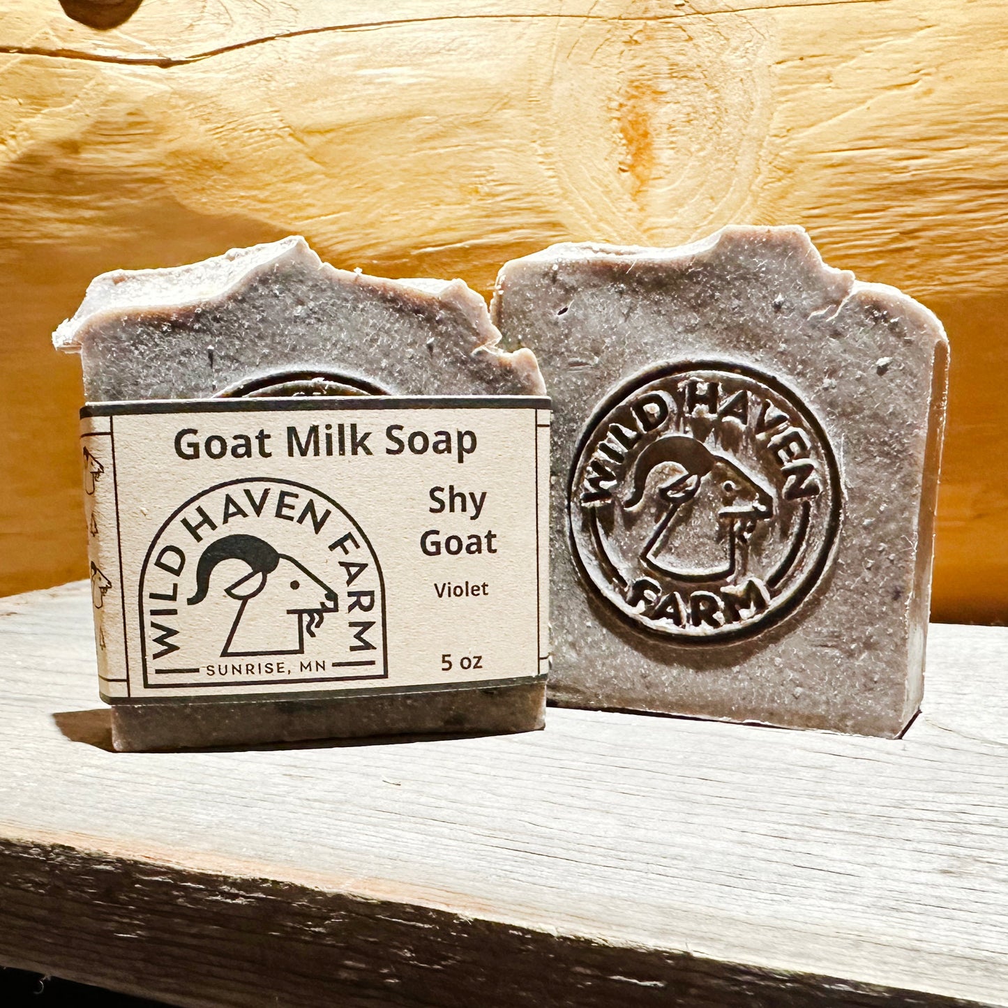 Grayish purple soap bars with goat logo