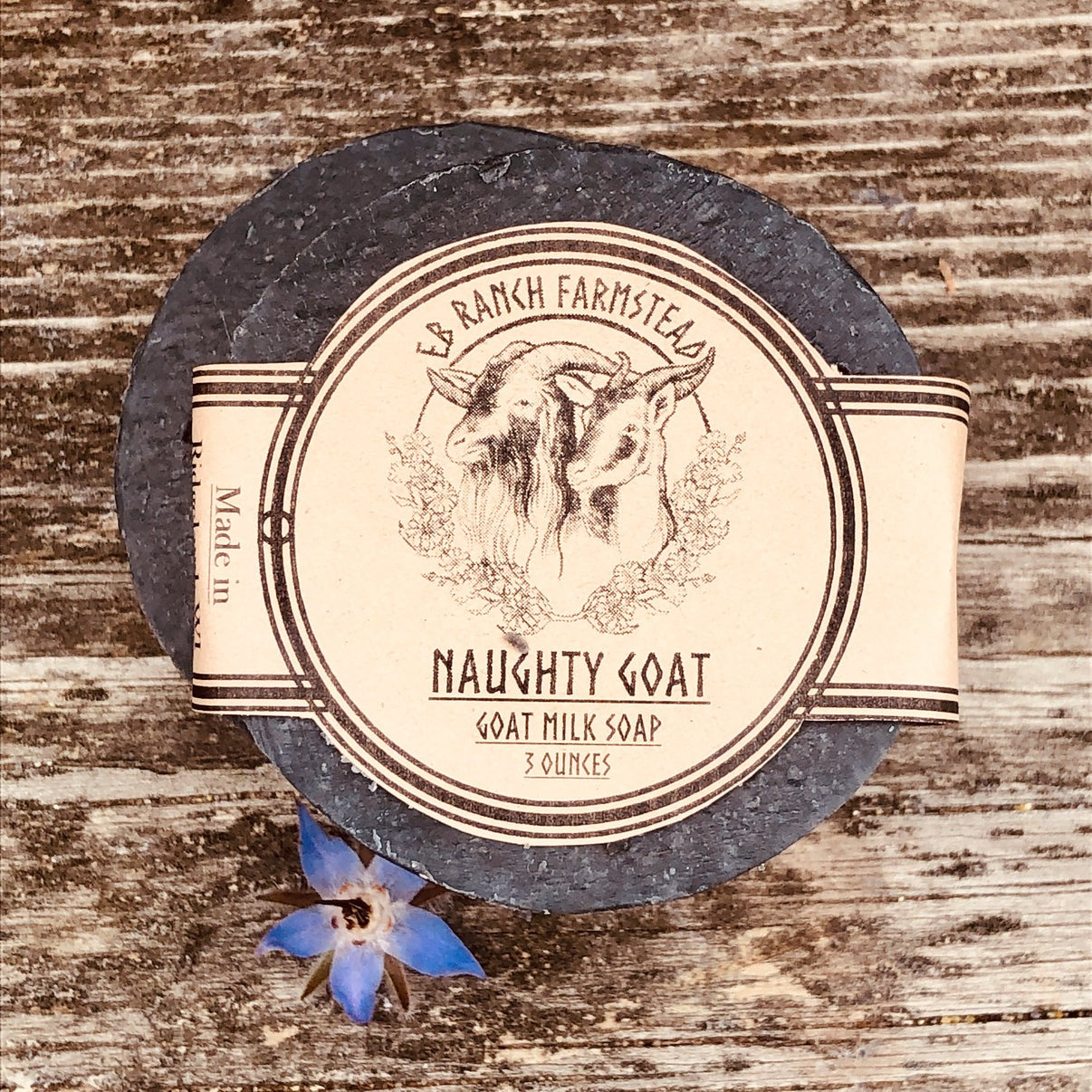 Bar of Wild Haven Farm's Naughty Goat goat milk soap made with San Clemente Island goat milk